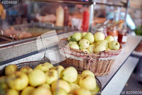 Image of apples in baskets at street market