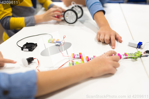 Image of children with building kit at robotics school