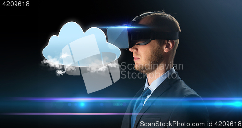 Image of businessman in virtual reality glasses or headset