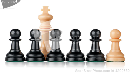 Image of White chess king and pawns