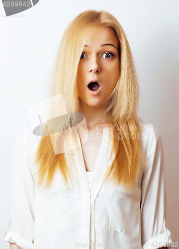 Image of young blond woman on white backgroung gesture thumbs up, isolate