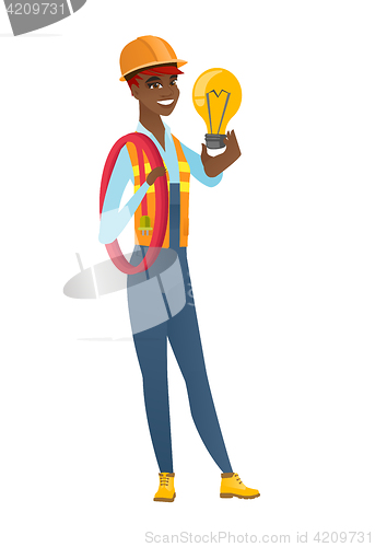 Image of Builder holding bright idea light bulb.