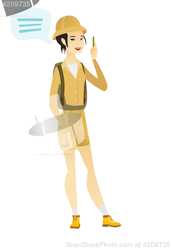 Image of Young asian traveler with speech bubble
