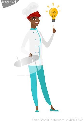 Image of Chef cook pointing at bright idea light bulb.
