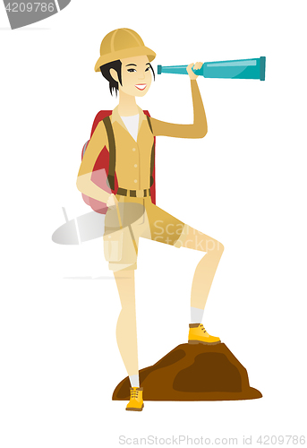 Image of Young asian traveler with spyglass.