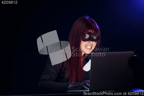 Image of Dangerous brunette in mask close-up