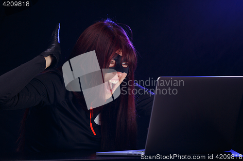 Image of Girl thief in black mask