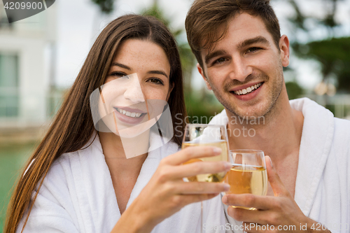 Image of Young couple tasting wine