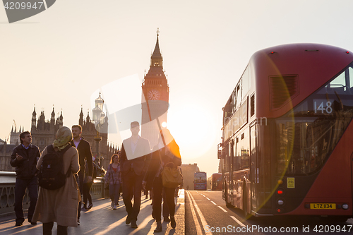 Image of Traffic and random people on Westminster Bridge in sunset, London, UK.