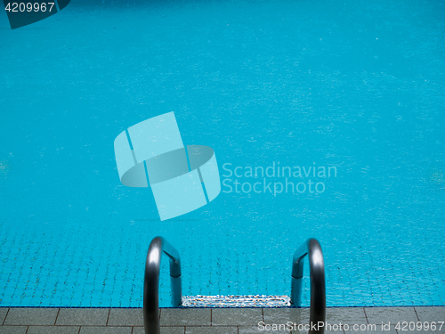 Image of Pool with ladder on edge