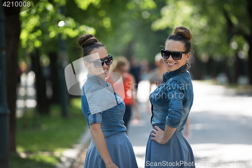 Image of twin sister with sunglasses