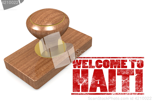 Image of Red rubber stamp with welcome to Haiti