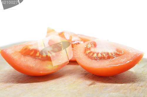 Image of Slice red tomato isolated