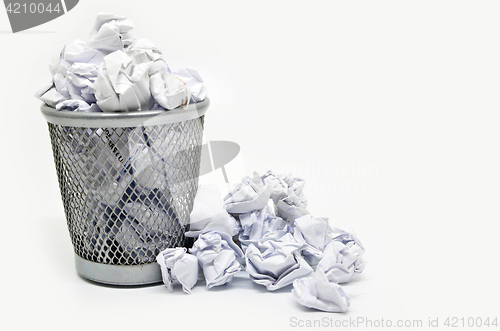 Image of Garbage bin with paper waste