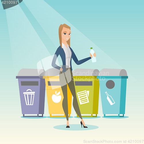 Image of Woman throwing away plastic bottle.