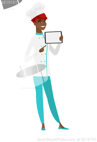 Image of Smiling chef cook holding tablet computer.