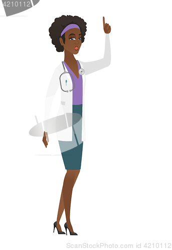 Image of Doctor with open mouth pointing finger up.