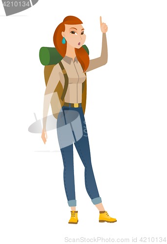 Image of Traveler with open mouth pointing finger up.