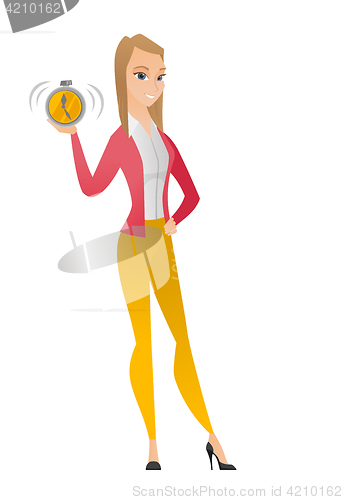 Image of Caucasian business woman holding alarm clock.