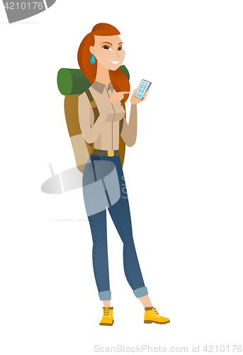 Image of Caucasian traveler holding a mobile phone.