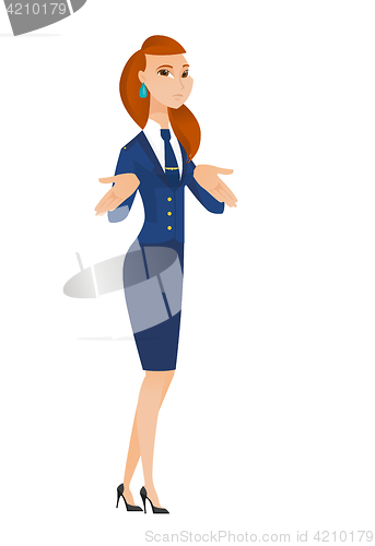 Image of Caucasian confused stewardess shrugging shoulders