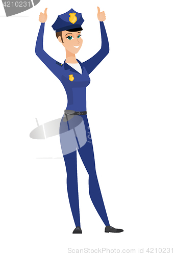 Image of Policewoman standing with raised arms up.