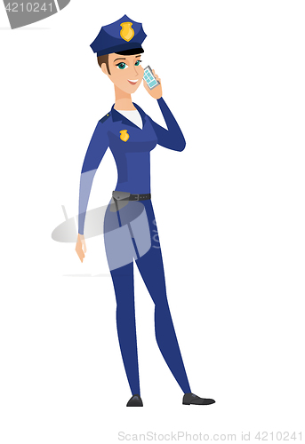 Image of Policewoman talking on a mobile phone.