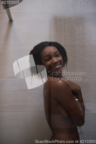 Image of African American woman in the shower