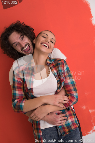 Image of couple in love  over color background