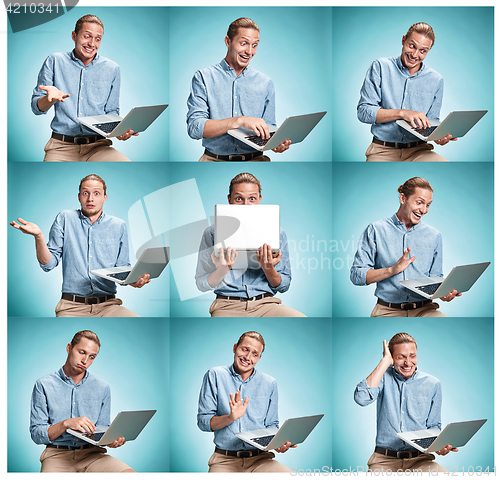 Image of The smiling young man in a blue shirt working on laptop