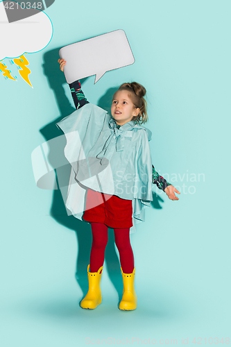 Image of Little girl posing in fashion style wearing autumn clothing.