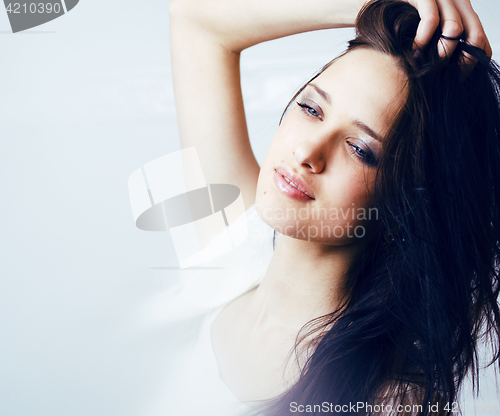 Image of beauty young brunette sad woman close up, nude makeup, lifestyle real people concept on white background