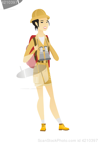 Image of Asian traveler woman with backpack and binoculars.