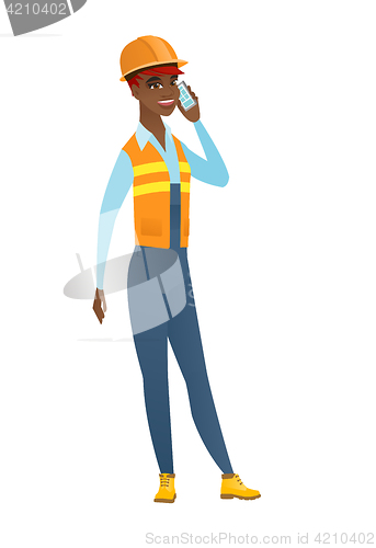 Image of Builder talking on a mobile phone.