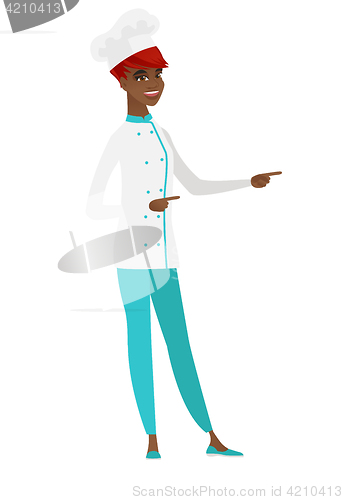 Image of African-american chef cook pointing to the side.