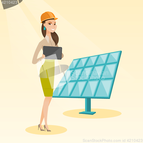 Image of Female worker of solar power plant.