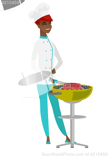 Image of Chef cook cooking steak on barbecue grill.