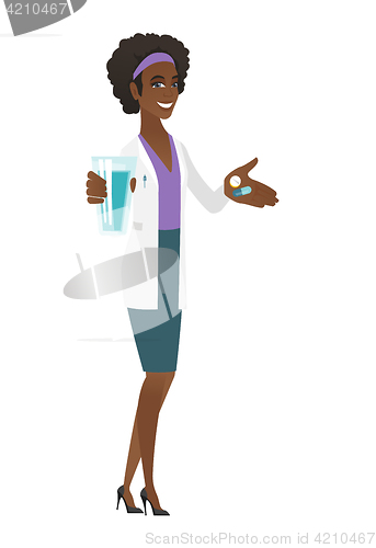 Image of Pharmacist giving pills and glass of water.