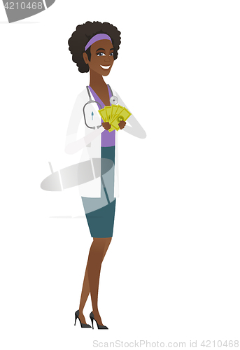 Image of Happy african-american doctor holding money.