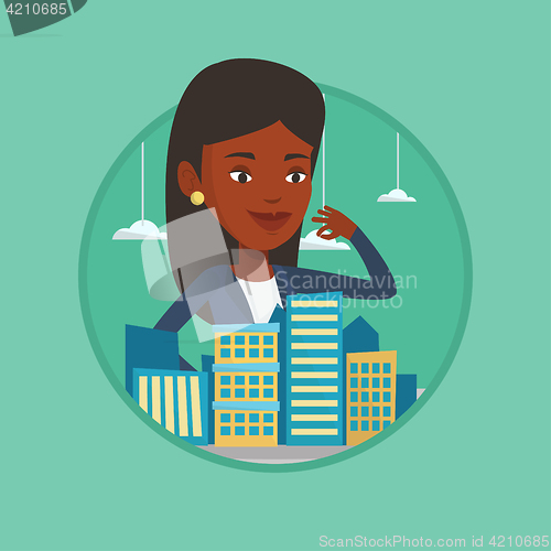 Image of Real estate agent presenting city model.