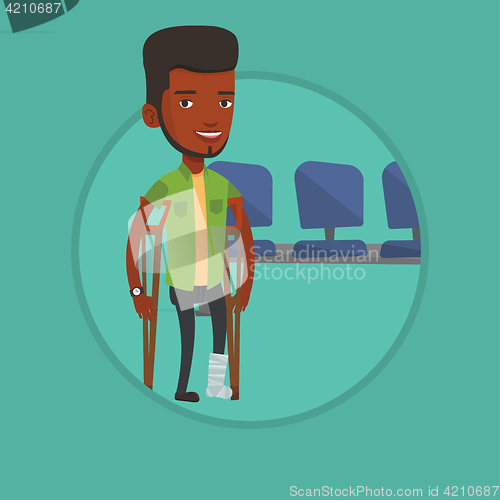 Image of Man with broken leg and crutches.