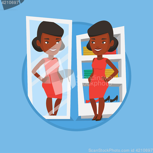 Image of Woman trying on clothes in dressing room.