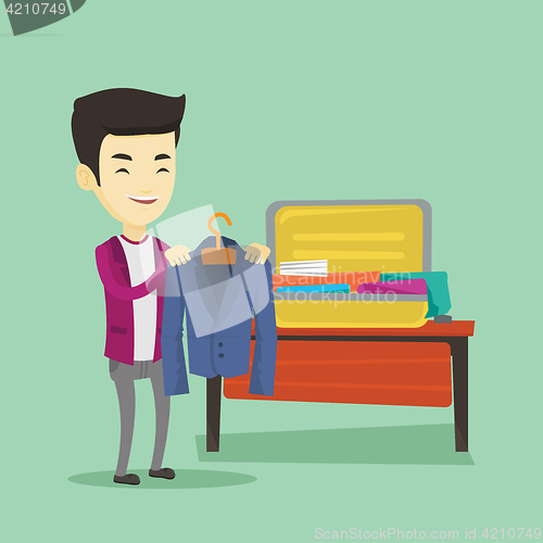 Image of Young man packing his suitcase vector illustration