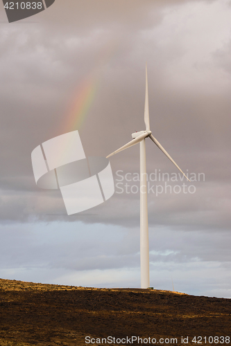Image of Wind Turbine Green Energy Rain Weather Rainbow 