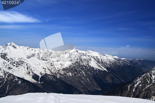 Image of View on winter mountains from off-piste ski slope