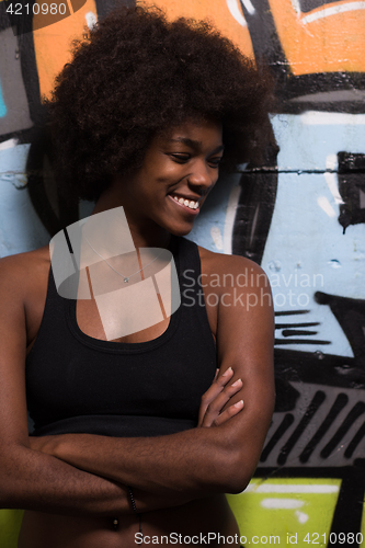 Image of black woman after a workout at the gym