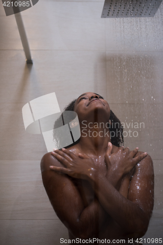 Image of African American woman in the shower