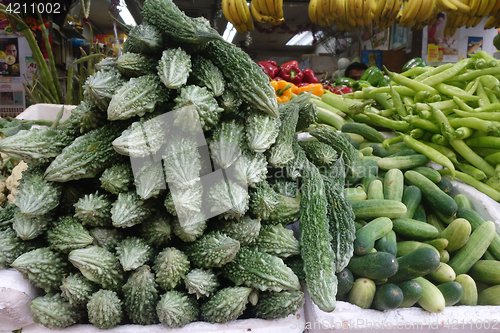 Image of Vegetables and fruits on display in grocery store