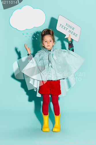 Image of Little girl posing in fashion style wearing autumn clothing.