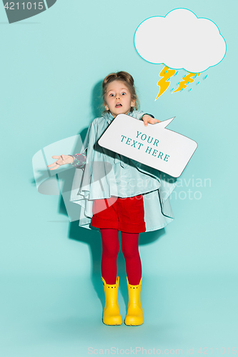 Image of Little girl posing in fashion style wearing autumn clothing.